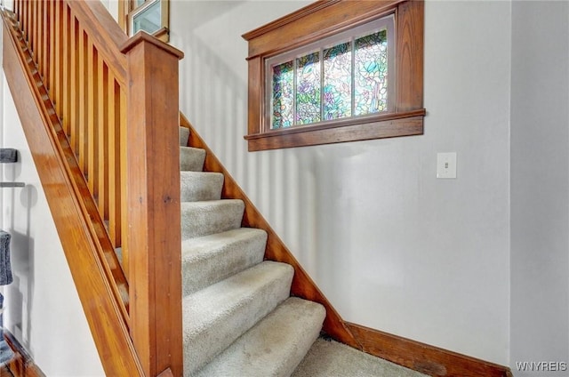 staircase with baseboards