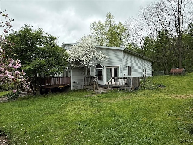 62 Pleasant Valley Rd, Groton, NY 13073 - rear view of property featuring a deck and a yard