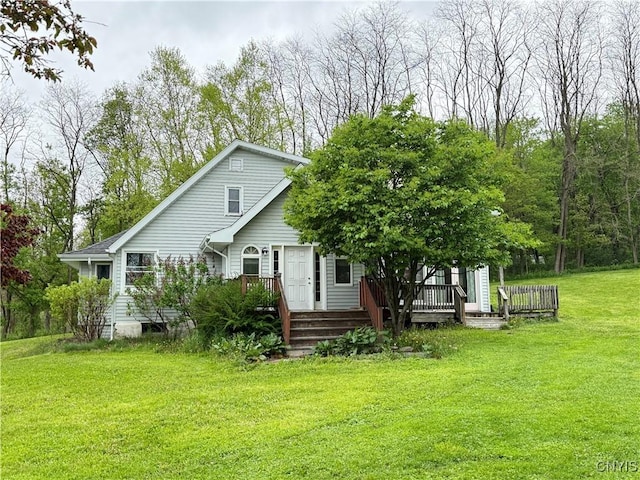 62 Pleasant Valley Rd, Groton, NY 13073 - back of house featuring a lawn and a wooden deck