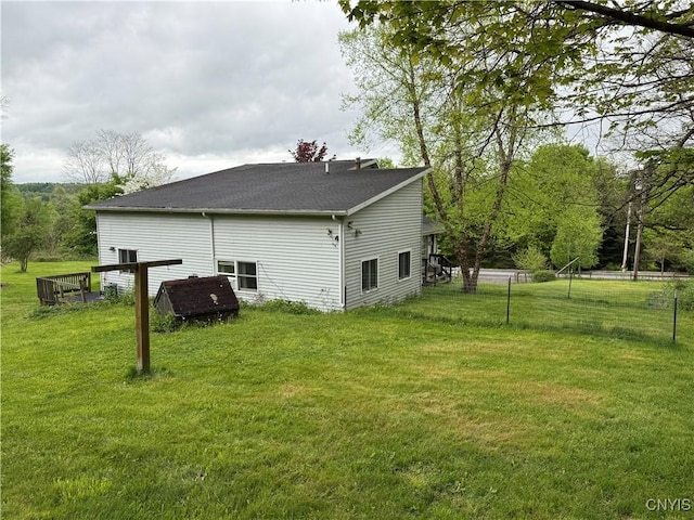 62 Pleasant Valley Rd, Groton, NY 13073 - back of house featuring a yard and a shingled roof