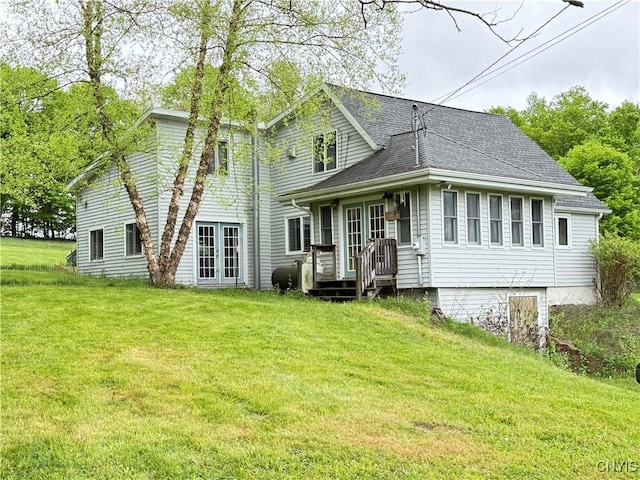 62 Pleasant Valley Rd, Groton, NY 13073 - back of property featuring french doors, a lawn, a shingled roof, and heating fuel