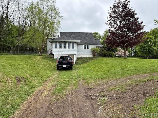 62 Pleasant Valley Rd, Groton, NY 13073 - view of side of home with driveway, a lawn, and roof with shingles