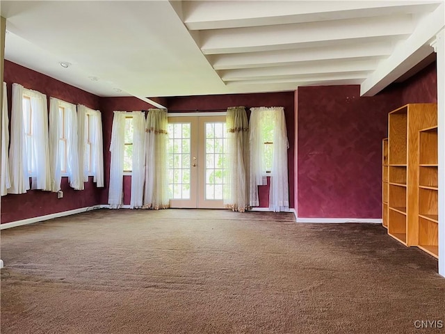 62 Pleasant Valley Rd, Groton, NY 13073 - unfurnished room with carpet flooring, french doors, baseboards, and beamed ceiling