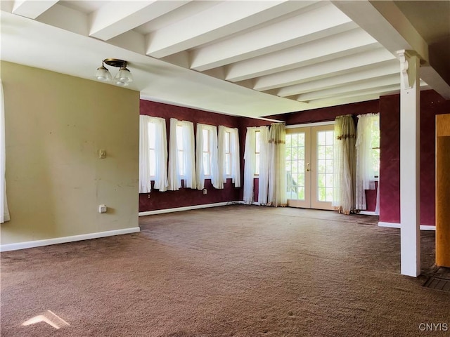 62 Pleasant Valley Rd, Groton, NY 13073 - empty room with carpet, beam ceiling, french doors, and baseboards