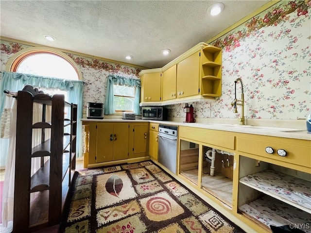 62 Pleasant Valley Rd, Groton, NY 13073 - kitchen with wallpapered walls, open shelves, a textured ceiling, light countertops, and a sink