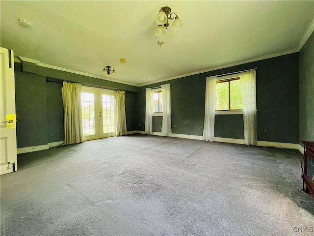 62 Pleasant Valley Rd, Groton, NY 13073 - unfurnished room featuring ornamental molding, plenty of natural light, french doors, carpet floors, and baseboards