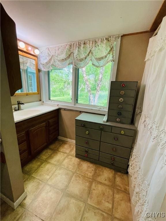 62 Pleasant Valley Rd, Groton, NY 13073 - full bath with vanity and baseboards