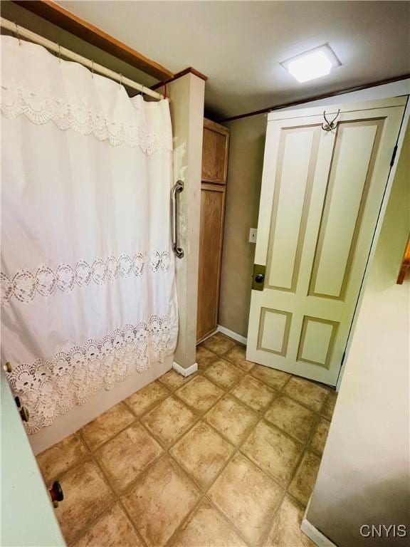 62 Pleasant Valley Rd, Groton, NY 13073 - bathroom featuring a shower with shower curtain