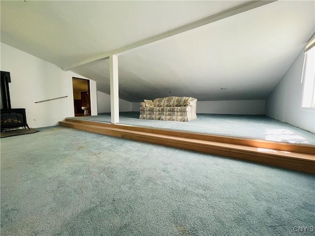 62 Pleasant Valley Rd, Groton, NY 13073 - bonus room featuring vaulted ceiling, carpet floors, and a wood stove