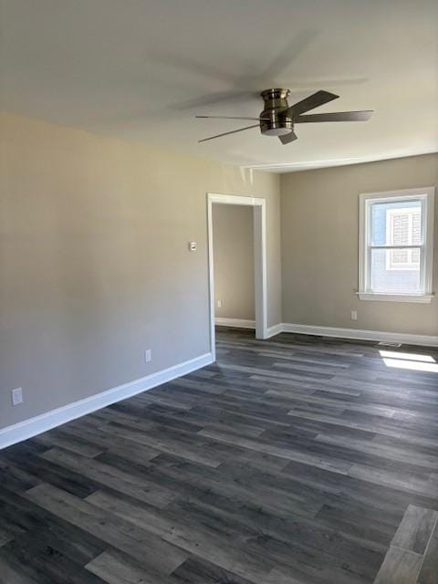 34 Sunnyside Dr, Elmira, NY 14905 - empty room with ceiling fan, dark wood-style floors, and baseboards