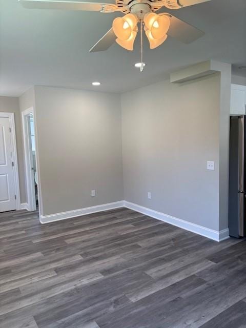 34 Sunnyside Dr, Elmira, NY 14905 - unfurnished room featuring baseboards, dark wood finished floors, and ceiling fan