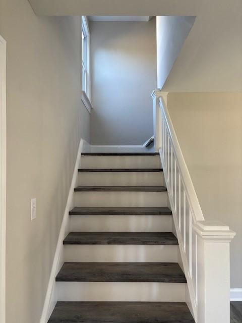 34 Sunnyside Dr, Elmira, NY 14905 - stairway featuring baseboards and wood finished floors