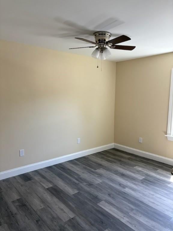 34 Sunnyside Dr, Elmira, NY 14905 - spare room with a ceiling fan, dark wood-style flooring, and baseboards