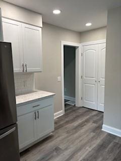34 Sunnyside Dr, Elmira, NY 14905 - kitchen featuring freestanding refrigerator, light countertops, baseboards, dark wood-style flooring, and recessed lighting