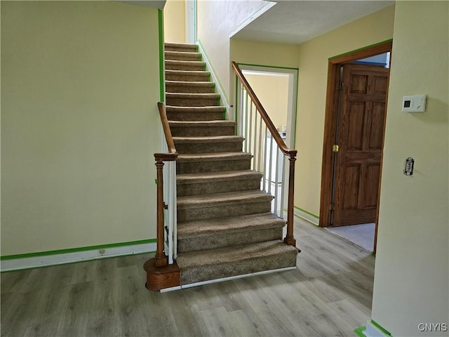 343 N Peterboro St, Lenox, NY 13032 - staircase featuring wood finished floors and baseboards