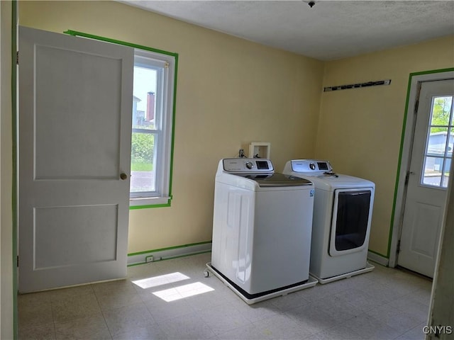 343 N Peterboro St, Lenox, NY 13032 - laundry area with washer and clothes dryer, baseboards, and light flooring