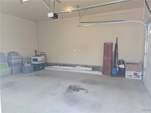343 N Peterboro St, Lenox, NY 13032 - garage featuring a garage door opener