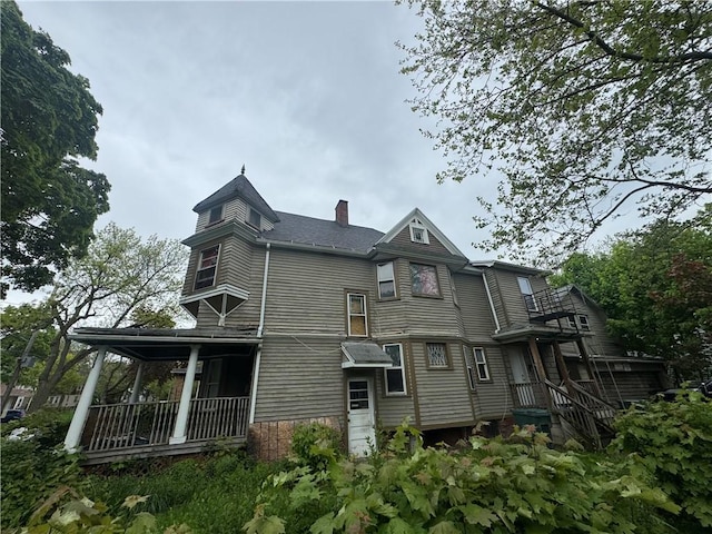 408 Glenwood Ave, Rochester, NY 14613 - back of house with a chimney