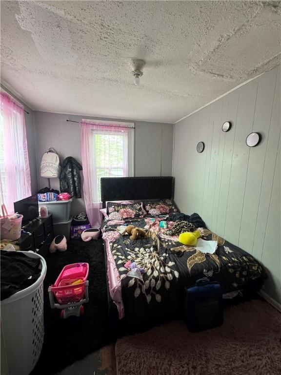 408 Glenwood Ave, Rochester, NY 14613 - bedroom with a textured ceiling