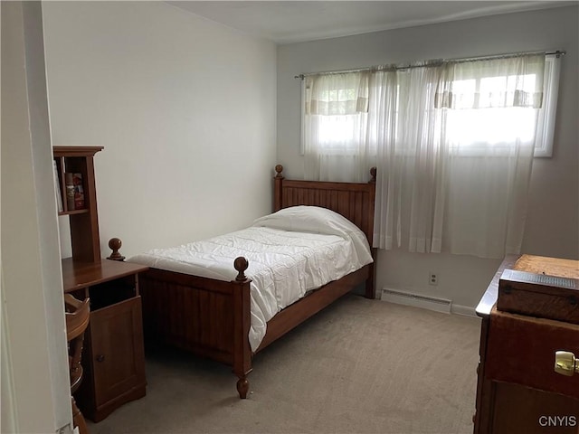 5180 Jamesville Rd, Dewitt, NY 13078 - bedroom with a baseboard radiator and light carpet