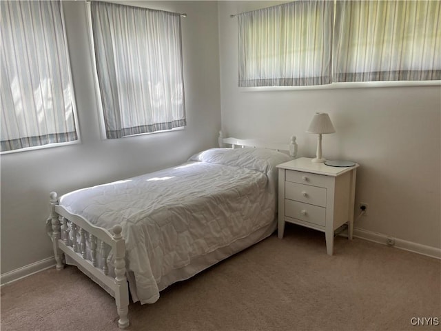 5180 Jamesville Rd, Dewitt, NY 13078 - carpeted bedroom featuring baseboards