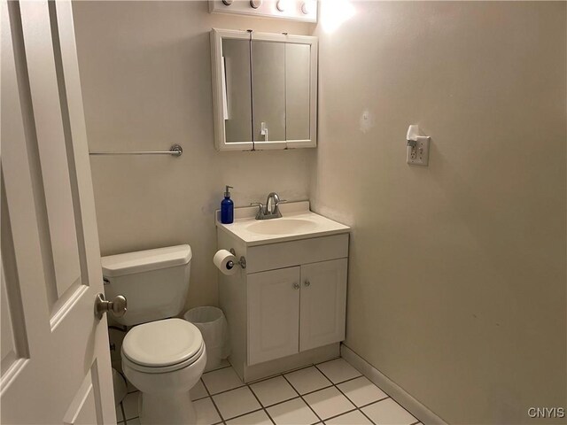 5180 Jamesville Rd, Dewitt, NY 13078 - bathroom featuring tile patterned floors, toilet, and vanity