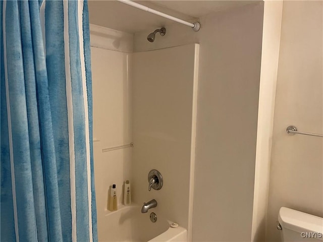 5180 Jamesville Rd, Dewitt, NY 13078 - bathroom featuring shower / bath combo with shower curtain and toilet