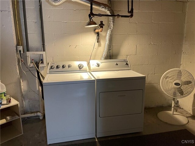 5180 Jamesville Rd, Dewitt, NY 13078 - laundry area featuring independent washer and dryer and concrete block wall