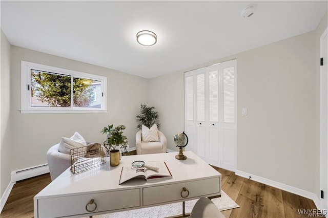 425 W Ln, Lewiston, NY 14092 - home office with a baseboard heating unit, light wood-style floors, and baseboards