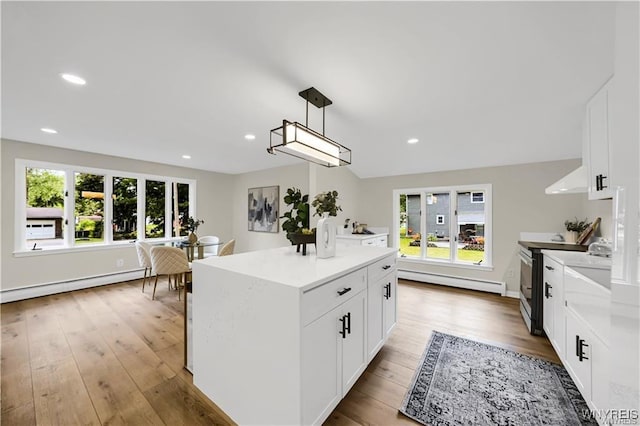 425 W Ln, Lewiston, NY 14092 - kitchen with baseboard heating, stainless steel electric range oven, plenty of natural light, and recessed lighting