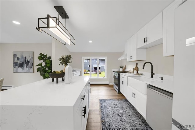 425 W Ln, Lewiston, NY 14092 - kitchen with dishwasher, stainless steel electric range, a sink, a kitchen island, and white cabinetry