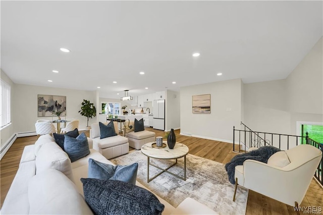 425 W Ln, Lewiston, NY 14092 - living room featuring recessed lighting, wood finished floors, and baseboards