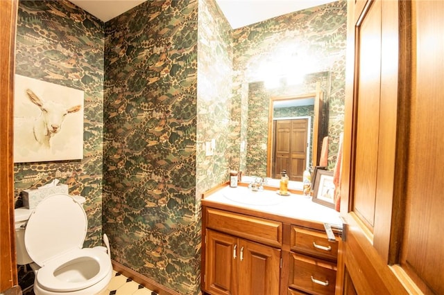 1177 County Highway 26, Otsego, NY 13337 - bathroom with wallpapered walls, toilet, and vanity