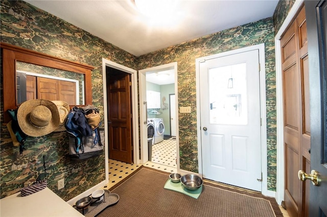 1177 County Highway 26, Otsego, NY 13337 - foyer featuring wallpapered walls, washer and clothes dryer, and baseboards