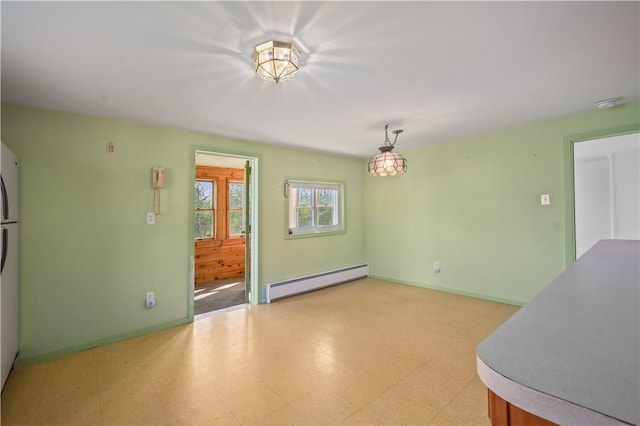 725 Arabia Rd, Summit, NY 12175 - unfurnished dining area with a baseboard radiator and light floors