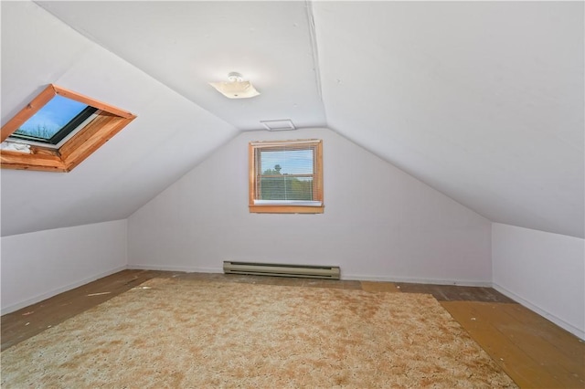 725 Arabia Rd, Summit, NY 12175 - additional living space with a baseboard heating unit, lofted ceiling, a skylight, and baseboards