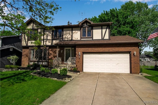 tudor house featuring brick siding, a front lawn, and concrete driveway