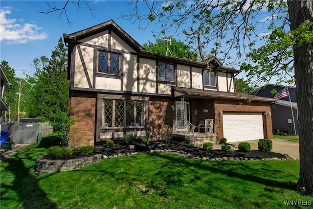 english style home featuring brick siding, concrete driveway, and stucco siding