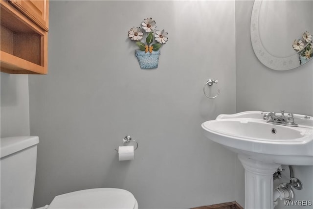 bathroom featuring toilet