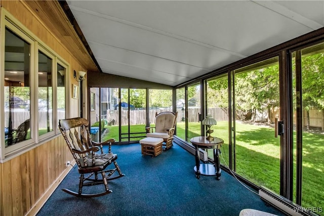 sunroom / solarium with vaulted ceiling