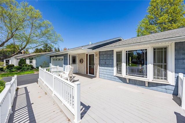 deck with an attached garage