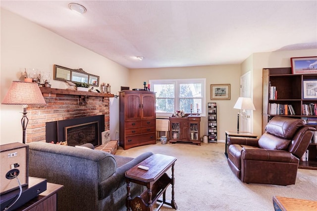 living area with light carpet and a brick fireplace