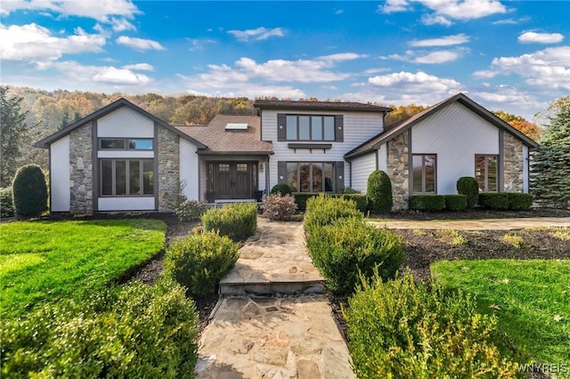 9811 Deer Creek Rd, Genesee, NY 14770 - view of front of property featuring stone siding and a front lawn