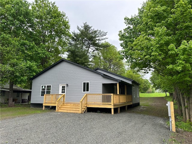 258 Mcmaster St, Bath, NY 14810 - manufactured / mobile home featuring a deck
