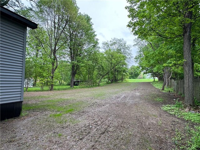 258 Mcmaster St, Bath, NY 14810 - view of yard featuring fence and dirt driveway