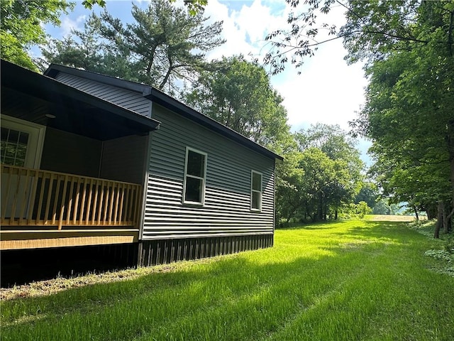 258 Mcmaster St, Bath, NY 14810 - view of side of home featuring a lawn