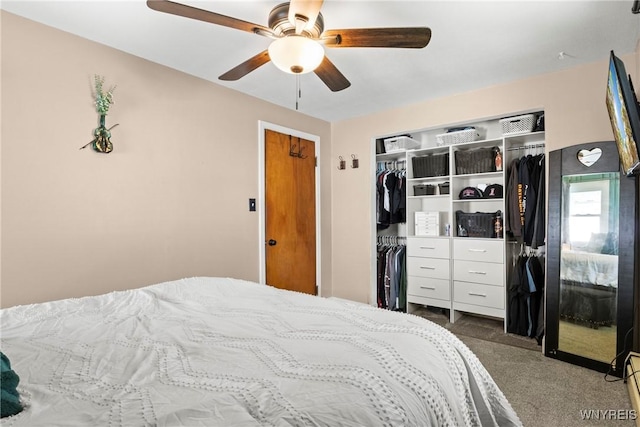 carpeted bedroom with a closet and ceiling fan