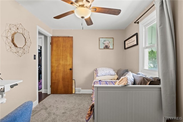 bedroom featuring carpet floors, ceiling fan, and baseboards
