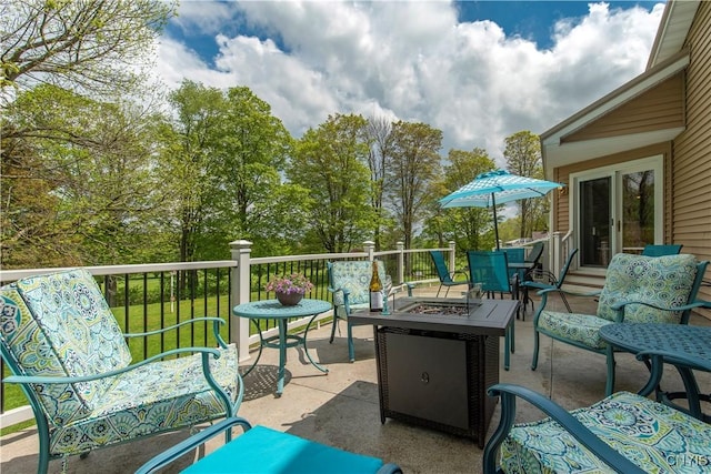 174 Camp Rd, Litchfield, NY 13322 - view of patio / terrace featuring a fire pit