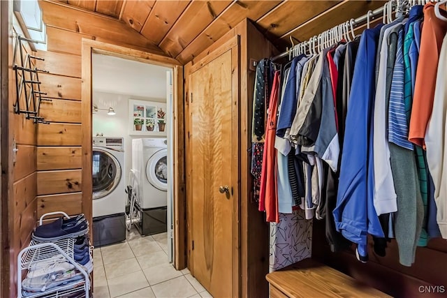 174 Camp Rd, Litchfield, NY 13322 - clothes washing area with washing machine and clothes dryer and light tile patterned floors